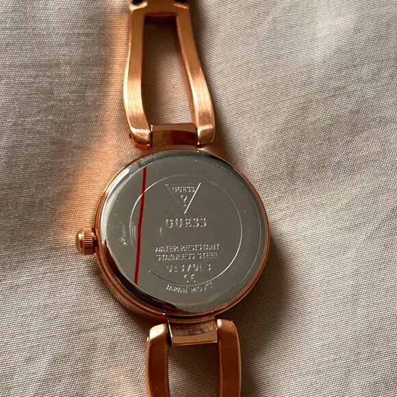Guess Rose Gold-Tone Cutout Bracelet Analog Watch - Picture 12 of 13
